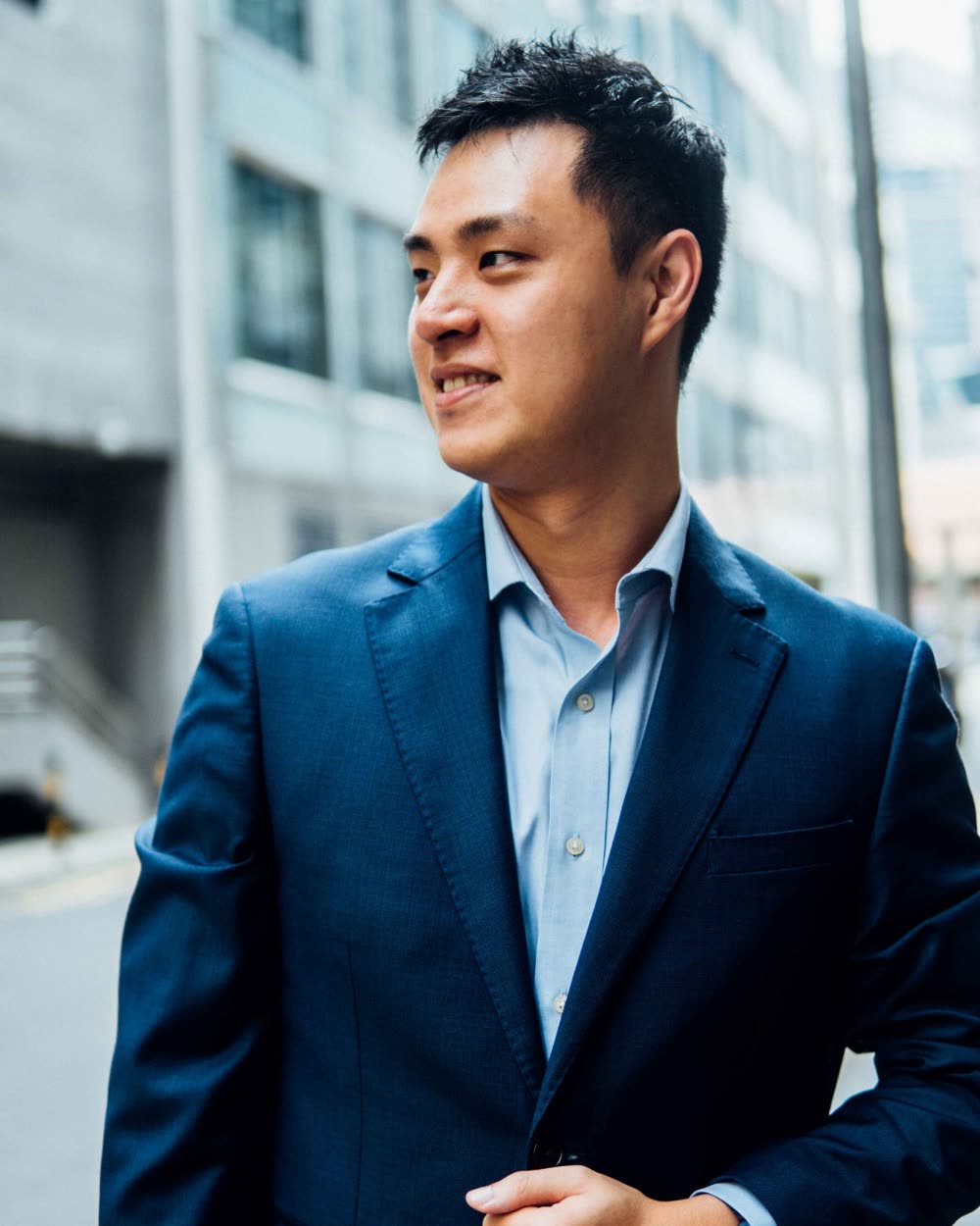 Chia Wei Goh, founder of CGULL, in a Singapore business district
